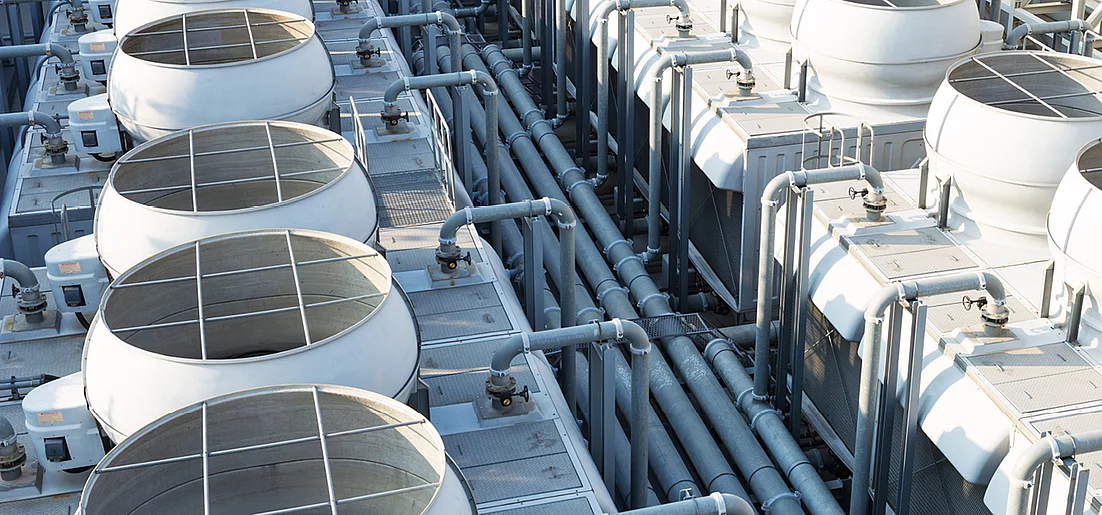 Legionella control in evaporative cooling systems